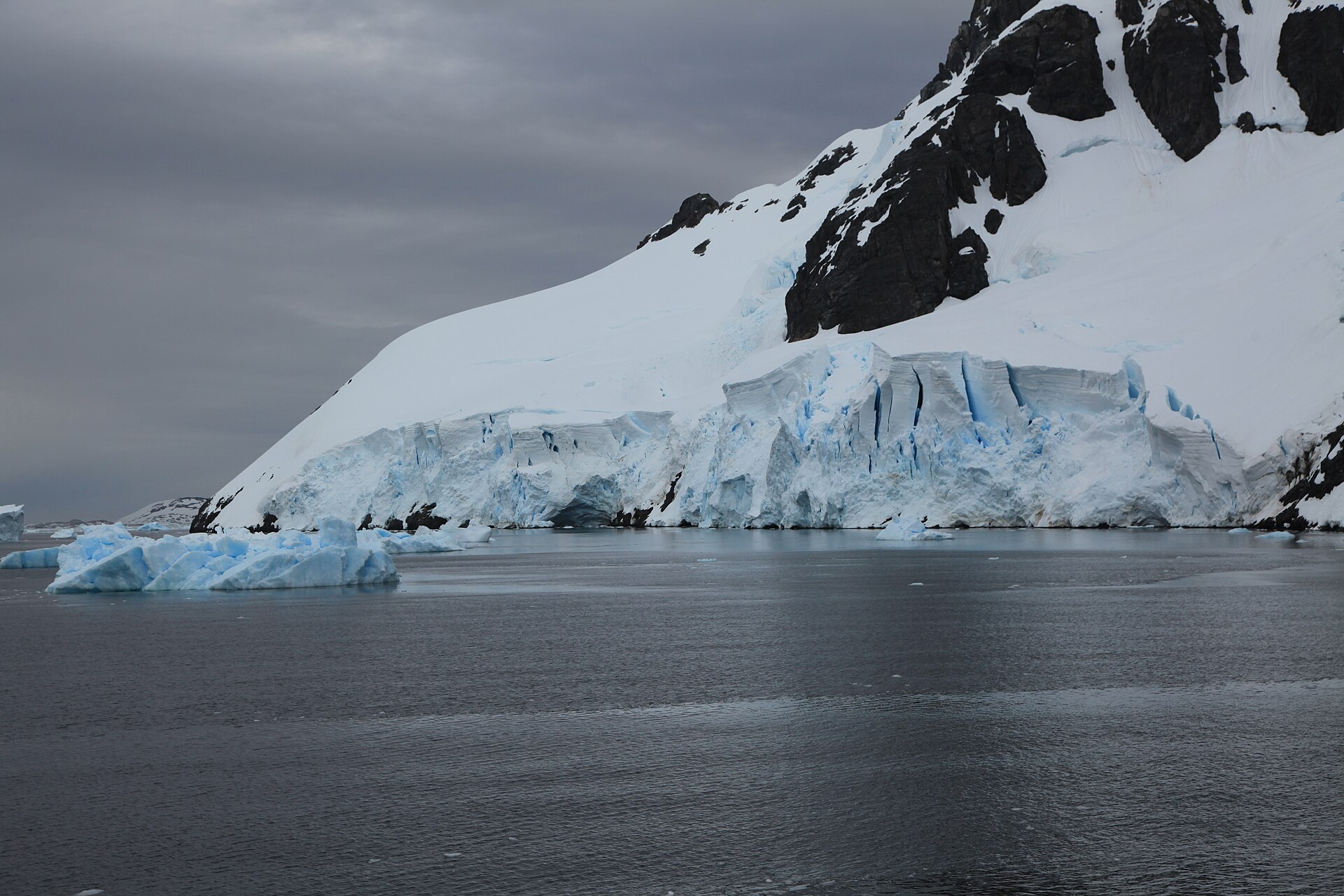 Lemaire Channel, a narrow strait of icebergs and mountains on the Antarctic Peninsula